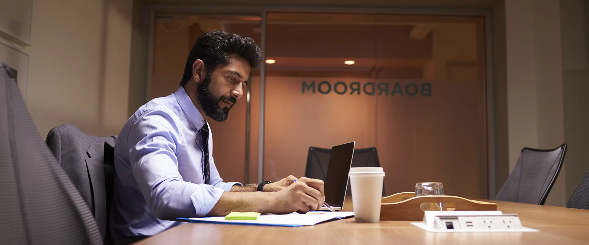 CXOs and entrepreneurs collaborating in a boardroom